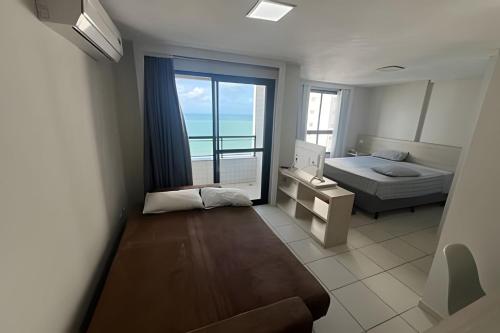 Postel nebo postele na pokoji v ubytování Natal, PontaNegra - Mar e Descanso