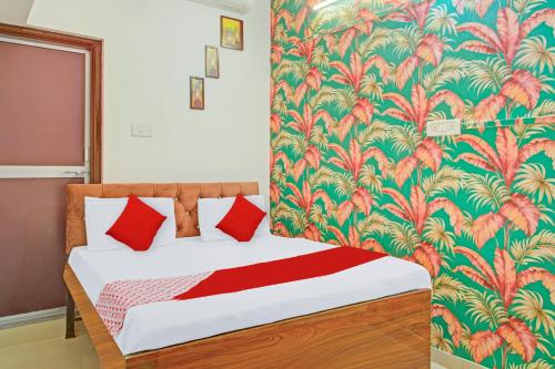 Hotel O Krishna Villaにあるベッド