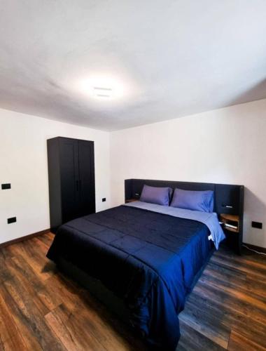 Cama o camas de una habitación en Borgo Emilius - CIR 0053