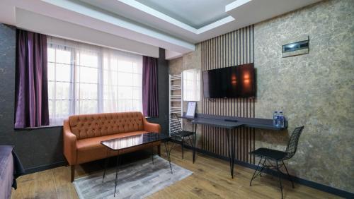 Televisyen dan/atau pusat hiburan di Nomad Hub Istanbul Suit