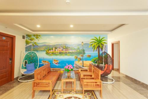 a dining room with a painting on the wall at Hopapa Hotel & Spa Phu Quoc in Phu Quoc