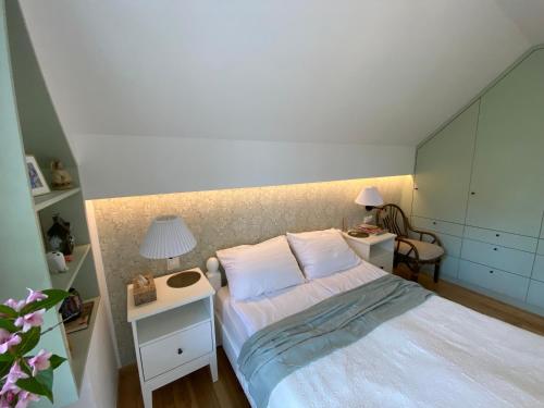 Ένα ή περισσότερα κρεβάτια σε δωμάτιο στο Holiday Villa Żuromino
