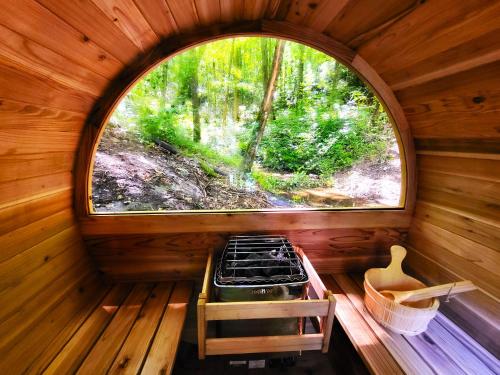 an inside view of a cabin with a round window at Ma & Pa's cabin at Cabin Fever in NC in Saluda