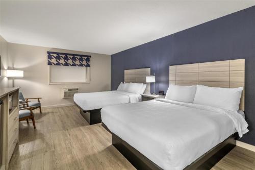 Ένα ή περισσότερα κρεβάτια σε δωμάτιο στο Best Western Caribou Inn
