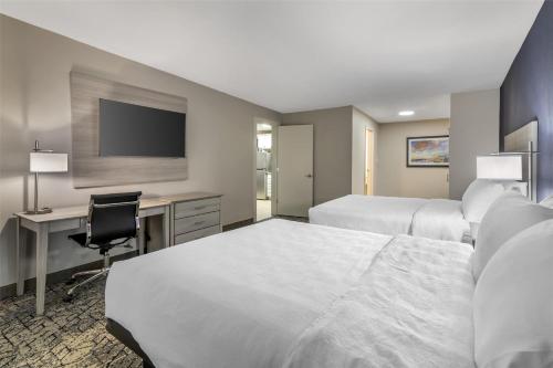 Ένα ή περισσότερα κρεβάτια σε δωμάτιο στο Best Western Caribou Inn