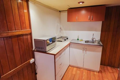 Kuchyň nebo kuchyňský kout v ubytování HISTORIC CENTRAL Apartment