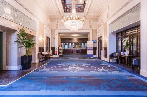 a large room with a large clock on the floor at Royal Station Hotel- Part of the Cairn Collection in Newcastle upon Tyne