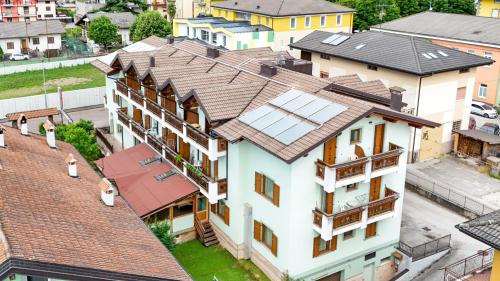 an overhead view of a house with solar panels on its roof at Hotel Caminetto - Rooms and Apartments in Cembra