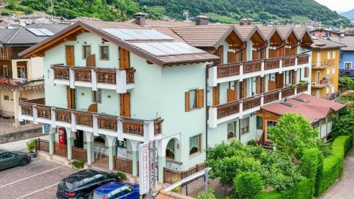 an overhead view of a building with a parking lot at Hotel Caminetto - Rooms and Apartments in Cembra