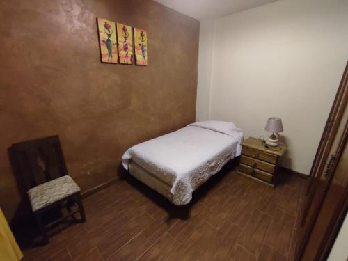 Katil atau katil-katil dalam bilik di HOTEL MAISON FIORI Plaza Colon
