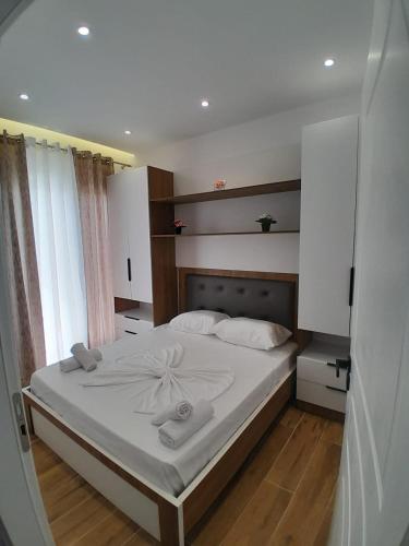 Ліжко або ліжка в номері Vila Damir