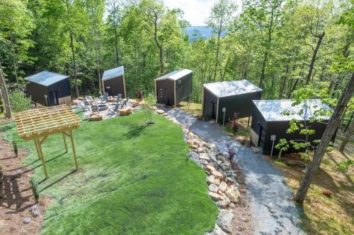 an overhead view of four shipping containers in a garden at The Atlas Cedar Treehouse at Treetop Escapes in Wildwood
