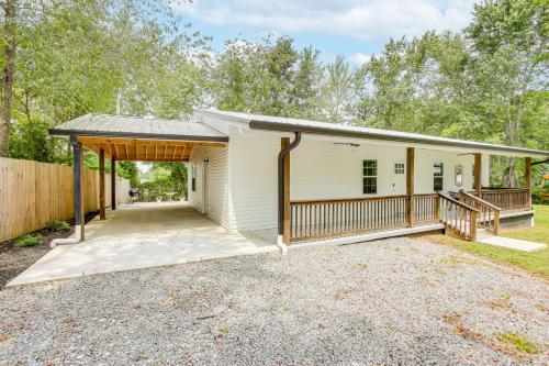 a home for sale in the woods with a covered driveway at half Mi to Kentucky Downs Franklin Home with Patio! in Franklin
