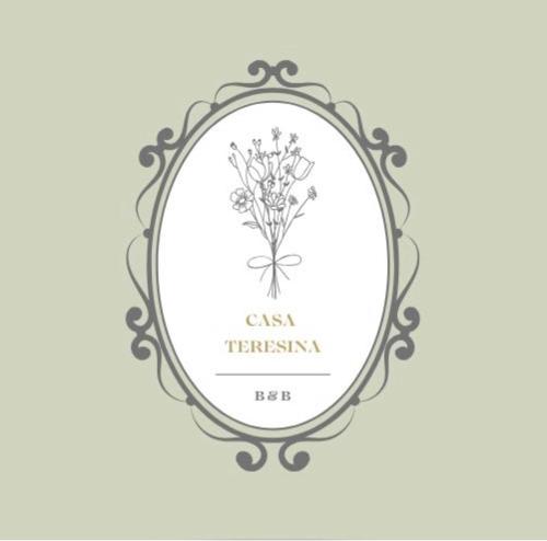 a picture of a frame with a flower logo at Casa Teresina in Mercatale