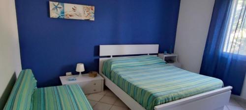 Una cama o camas en una habitación de SiciliaGranitola