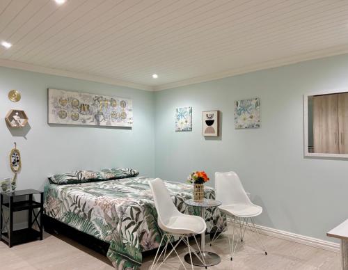 Ένα ή περισσότερα κρεβάτια σε δωμάτιο στο Bachelor Flat A