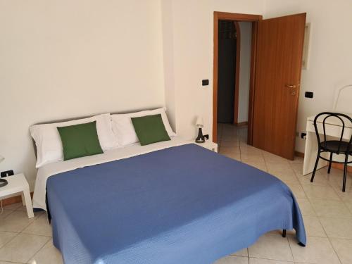 Ένα ή περισσότερα κρεβάτια σε δωμάτιο στο La casa di Dido