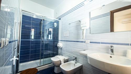 Koupelna v ubytování Agriturismo L'Oasi