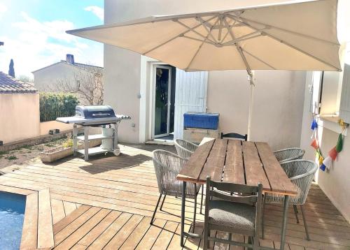 En terrasse eller udendørsområde på La Maison des Tuileries