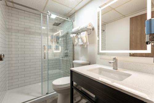 a bathroom with a toilet and a sink and a shower at Studio 6 Limon, CO I 70 in Limon