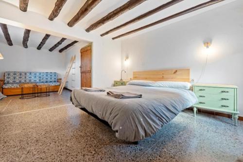 Postel nebo postele na pokoji v ubytování Casa el Ferrer