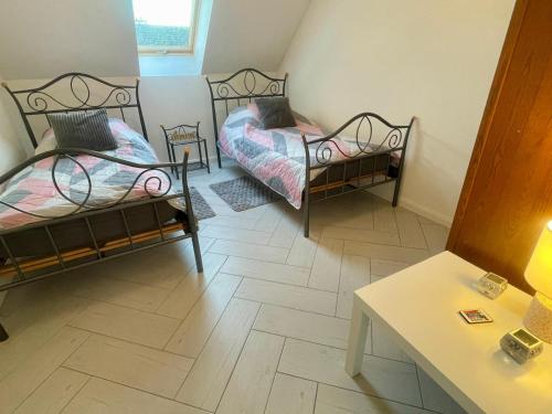 Katil atau katil-katil dalam bilik di Mazury Szczytno - Centrum II - Apartamenty u Krzyżaka