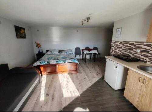 Kuchyňa alebo kuchynka v ubytovaní Domek Widokówka