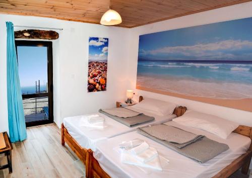 Ένα ή περισσότερα κρεβάτια σε δωμάτιο στο Villa Irena 2