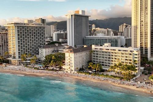 an aerial view of a beach and buildings at Moana Surfrider, A Westin Resort & Spa, Waikiki Beach in Honolulu