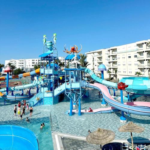 a large water park with a water slide at Holidays in Sousse Monastir 31 in Monastir