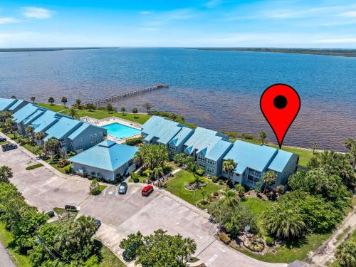 an overhead view of a resort with a red marker at Riverfront Condo w Water Views-Heated Pool in Port Charlotte