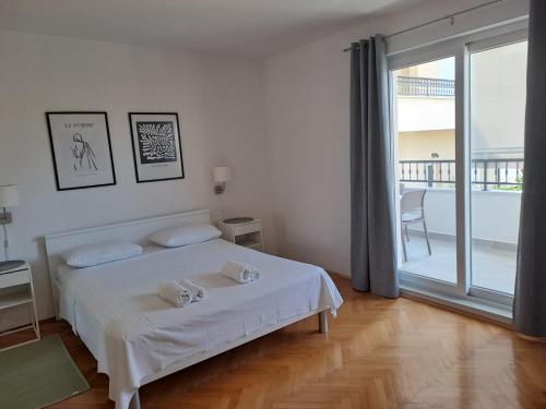 Postel nebo postele na pokoji v ubytování Large Apartment in Podgora - Makarska Rivijera just 80m beach distance