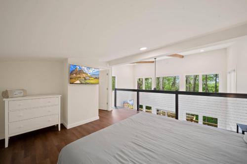 Ένα ή περισσότερα κρεβάτια σε δωμάτιο στο Appalachian Cottage