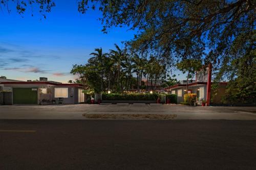 a row of houses with lights on a street at Sunny 1BR Hollywood Retreat – Pet Friendly in Hollywood