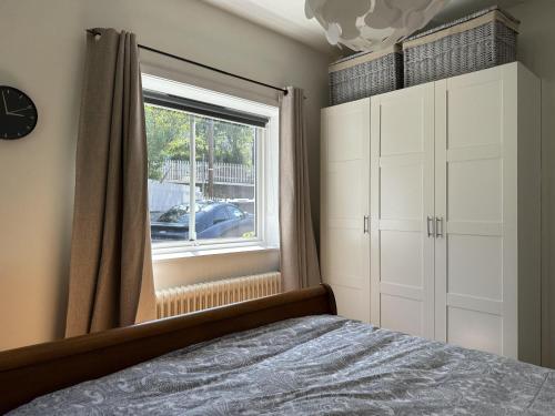 Cama o camas de una habitación en Cozy apartment with amazing view and location