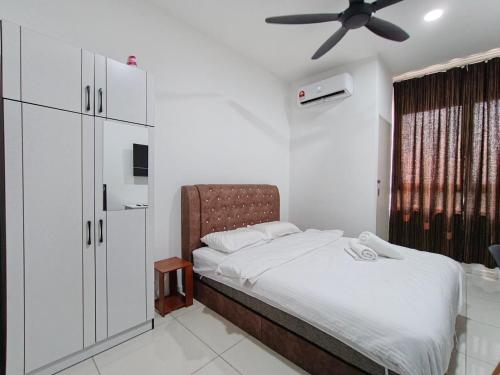 Ένα ή περισσότερα κρεβάτια σε δωμάτιο στο Peacehome horizon