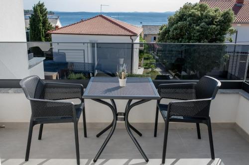 Apartments by the sea Banjol, Rab - 21635