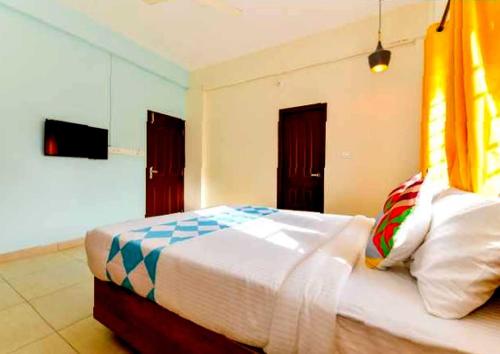 Ένα ή περισσότερα κρεβάτια σε δωμάτιο στο Hotel O CLASSIC STAY