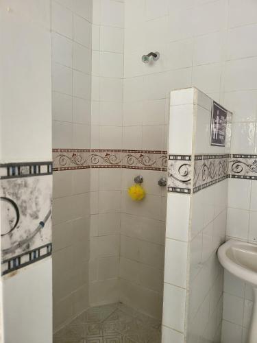 a bathroom with a shower and a sink at Hostal Tequila in Tequila