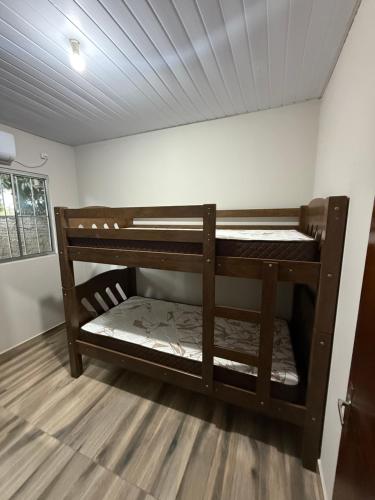 Postel nebo postele na pokoji v ubytování Casa Av parana