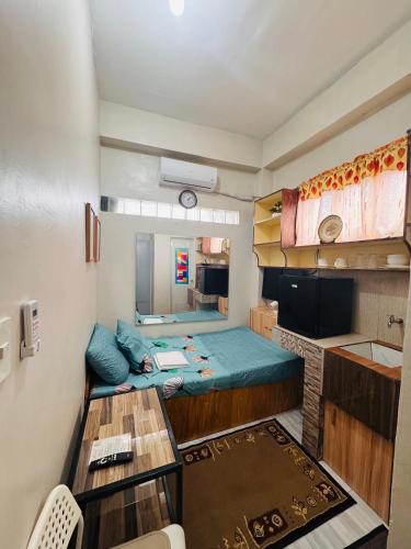 Kuchyň nebo kuchyňský kout v ubytování Cozy Solo Unit with Aircon , Wifi, Free Parking at Sonia's Island Stay