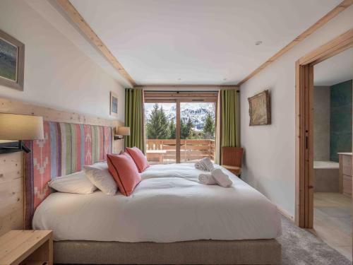 Duplex confort au pied des pistes avec parking à Méribel