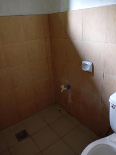 Koupelna v ubytování Affordable and Simple Homestay