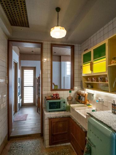 Una cocina o cocineta en 成說時光文旅