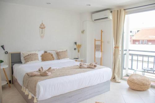 Kata Station Boutique Hotelにあるベッド