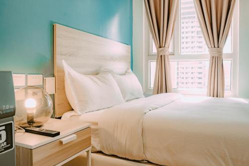Katil atau katil-katil dalam bilik di I Suites Hotel Malate
