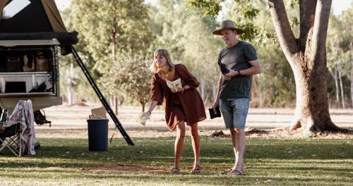 a man and a woman standing next to a tent at BIG4 Breeze Holiday Parks - Katherine in Katherine