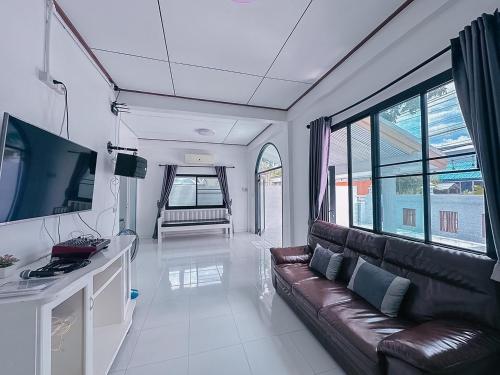 TV a/nebo společenská místnost v ubytování Baan Talay Home Jomtien Beach