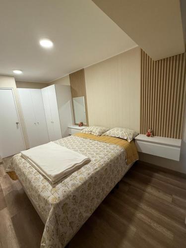 a bedroom with a large bed in a room at Apartment in La Victoria in Lima