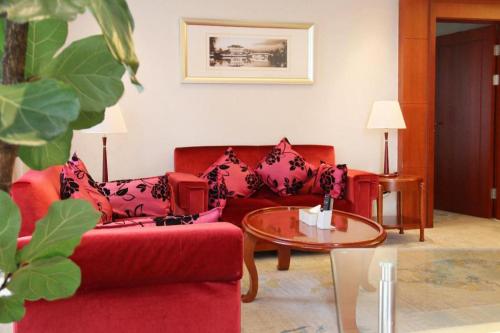 Posezení v ubytování Xian Qujiang Yinzuo Hotel